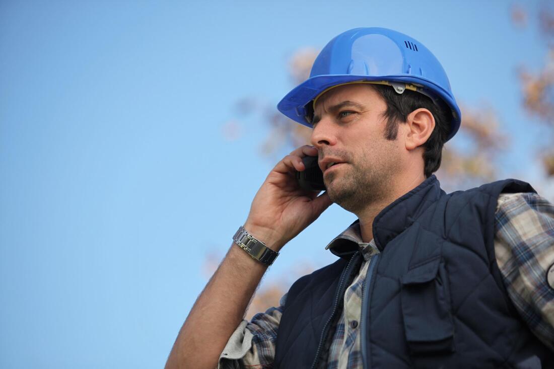 worker taking phone call