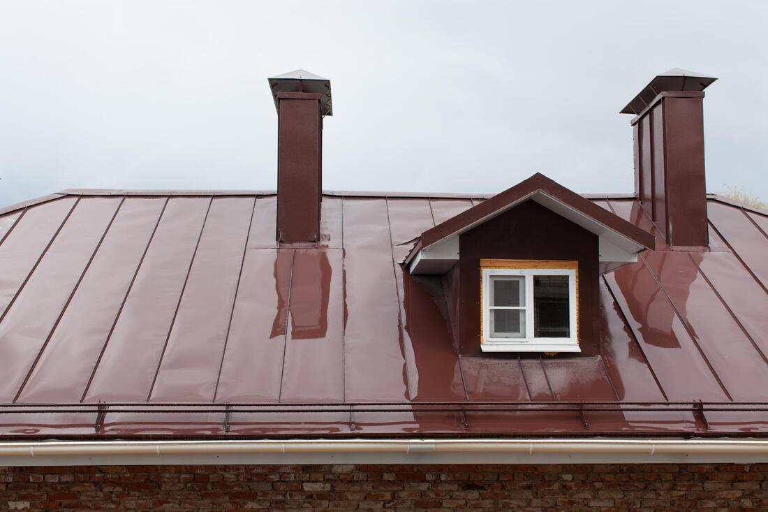 a shining brown flat metal roof